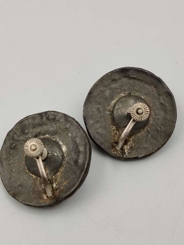Vintage screw on earrings unknown material