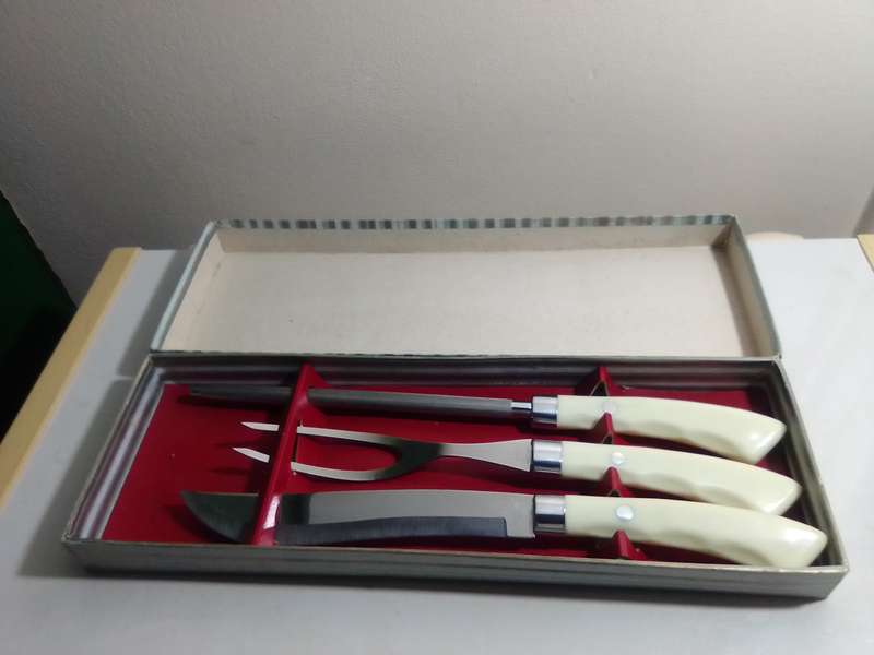 A Wedding present an old vintage Carving Knife Fork Set. Stainless Steel.