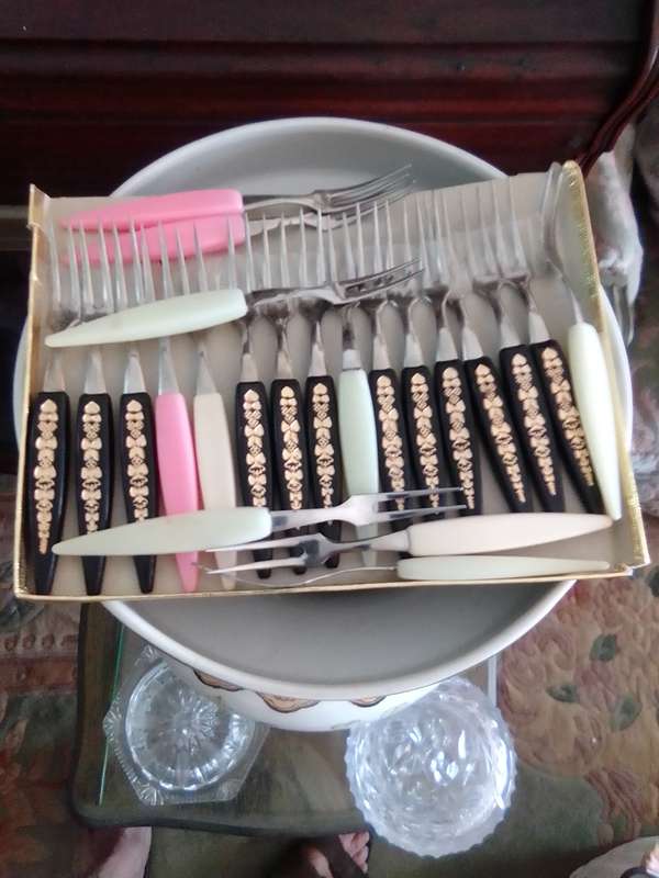 Mid century 1950's stainless steel and plastic mini cocktail forks. Made in Japan. 22 forks