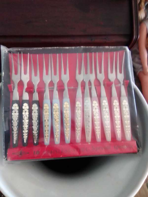 Dainty mid century 1950's stainless steel and plastic mini cocktail forks. Made in Japan. 12 forks.