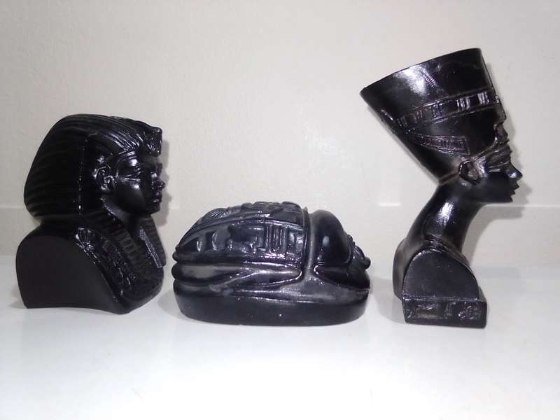 Tutankhamun and Nefertiti busts and a Heart Scarab, All hand sculptured out of Basalt hard stone.