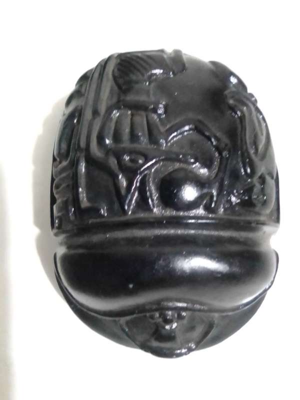 Tutankhamun and Nefertiti busts and a Heart Scarab, All hand sculptured out of Basalt hard stone.