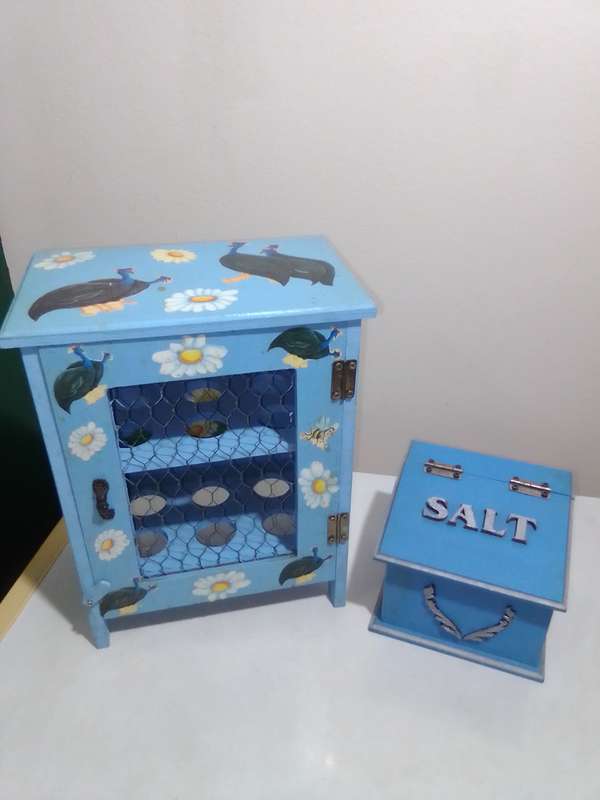 Wow a well decorated 12-egg wooden storage Cupboard + a Salt wooden holder.