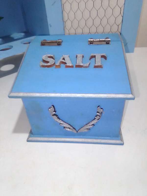 Wow a well decorated 12-egg wooden storage Cupboard + a Salt wooden holder.