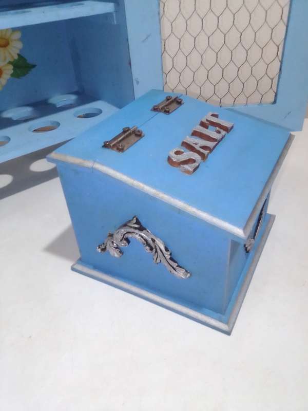 Wow a well decorated 12-egg wooden storage Cupboard + a Salt wooden holder.
