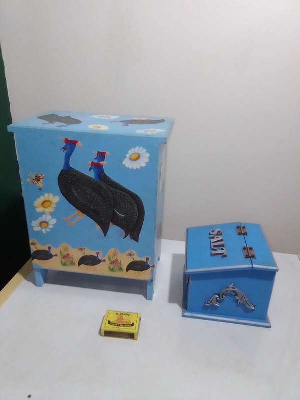 Wow a well decorated 12-egg wooden storage Cupboard + a Salt wooden holder.