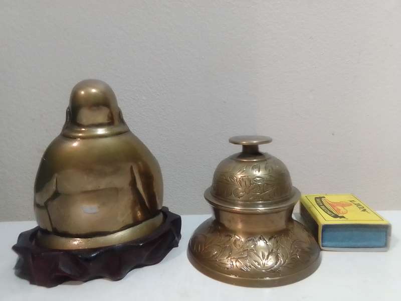 Awesome Antique Brass Buddha with wooden stand and Tempel bell and stand.