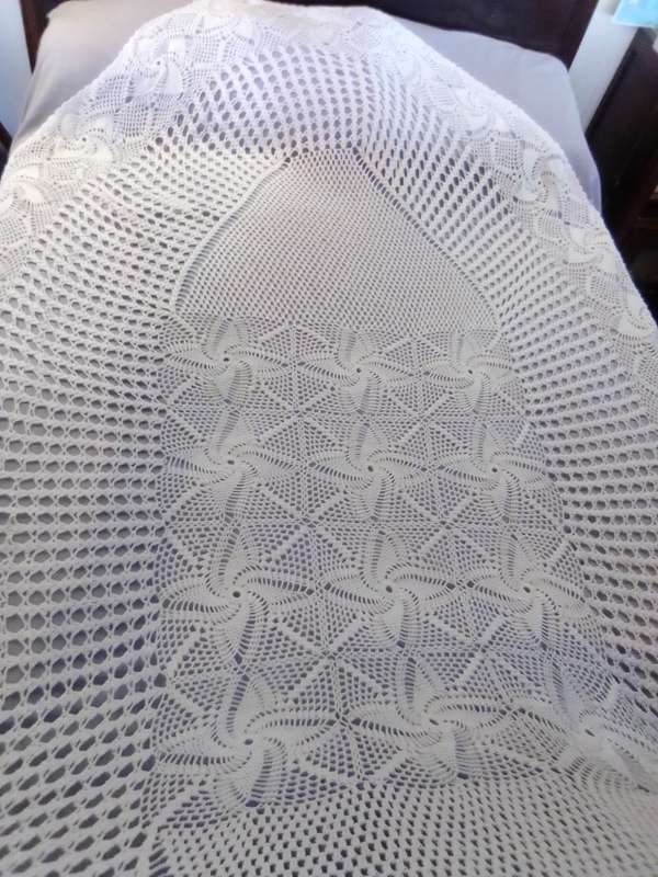 A extra large Hand Crocheted oblong/oval Tablecloth Size: 2.8mx1.7m in Excellent condition.