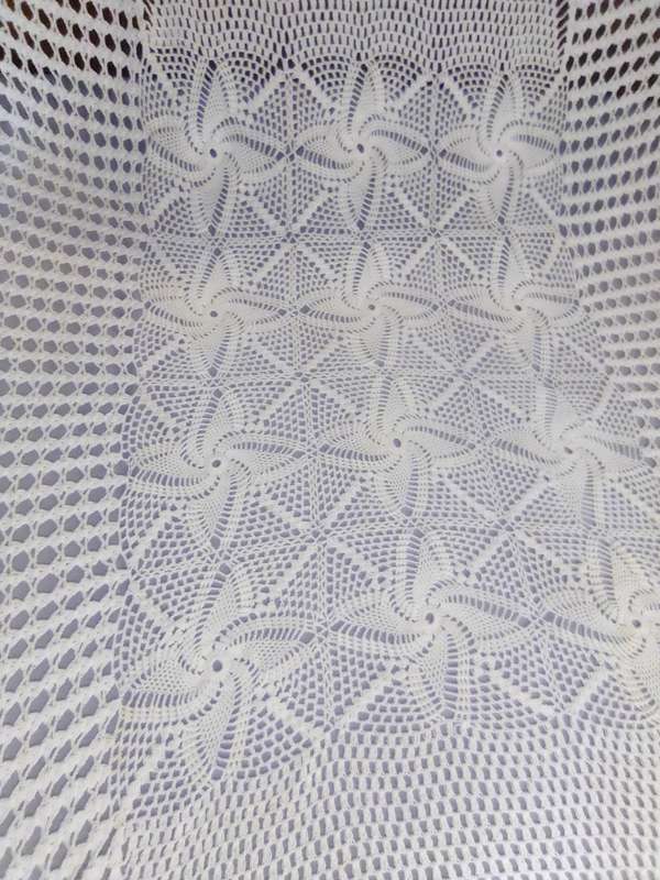 A extra large Hand Crocheted oblong/oval Tablecloth Size: 2.8mx1.7m in Excellent condition.