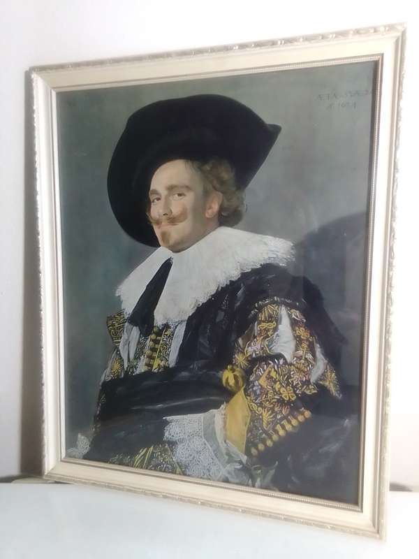 Signed {AETA-SVAE-26 A*1624}. A Print(1910) under Glass. The Laughing Cavalier by Frans Hals.