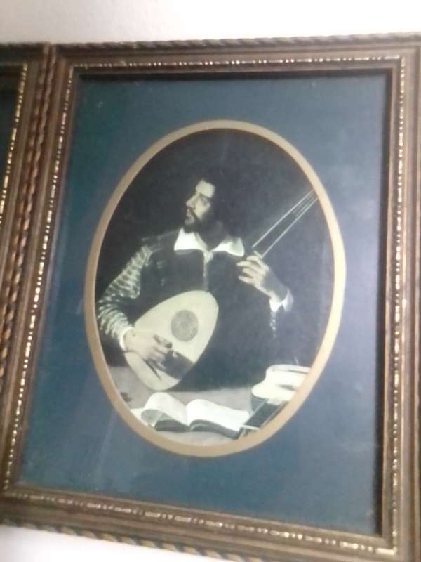 Medallion Wall Arts. Men at High finance and a musician earning his keep.