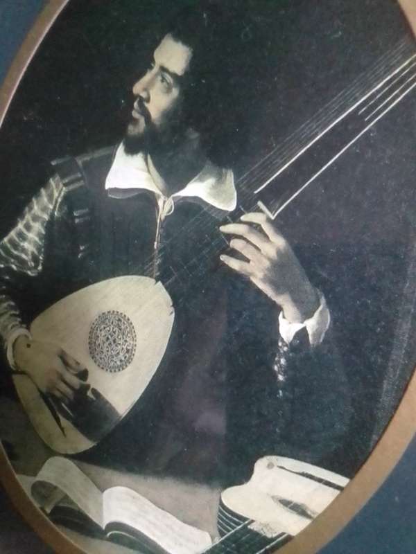 Medallion Wall Arts. Men at High finance and a musician earning his keep.