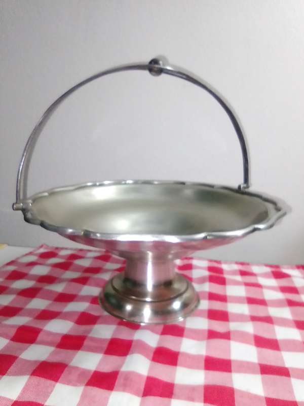 A large Vintage EPNS serving handled centre piece. For display in your home.