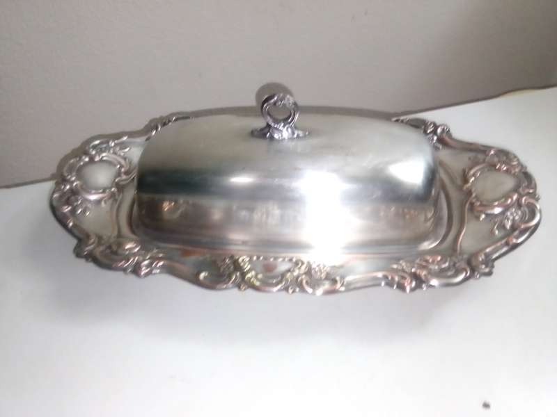 Wow. A ornate Silver Plate Lidded Butter with glass inner tray dish.