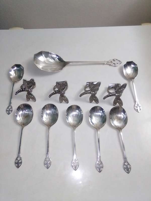 8 Grape fruit spoon set and 4 butterfly napkin rings