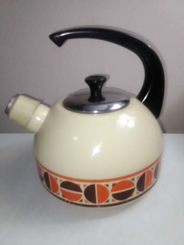 Fancy stove top whistling Kettle cream enamel with patons.
