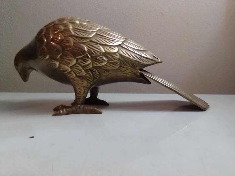 A Vintage pair of heavy brass Doves or Pigeons weighing combined at 2 Kg's in good condition.