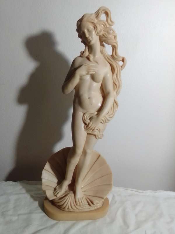 Vintage large nude Greek Lady in a shell. Stamped: A Santini on the shell. 42cm Tall