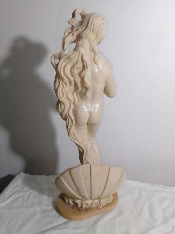 Vintage large nude Greek Lady in a shell. Stamped: A Santini on the shell. 42cm Tall