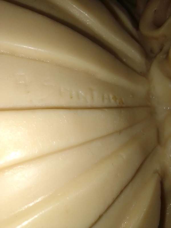 Vintage large nude Greek Lady in a shell. Stamped: A Santini on the shell. 42cm Tall