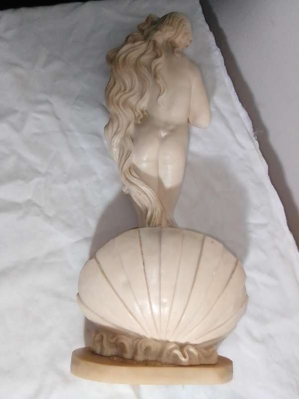 Vintage large nude Greek Lady in a shell. Stamped: A Santini on the shell. 42cm Tall