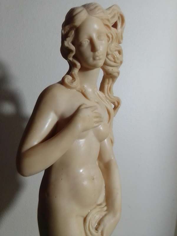 Vintage large nude Greek Lady in a shell. Stamped: A Santini on the shell. 42cm Tall