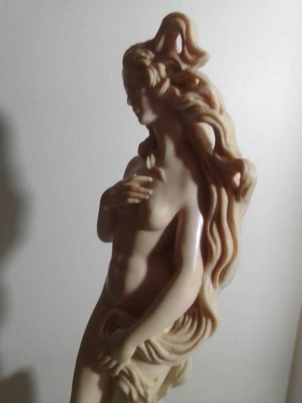 Vintage large nude Greek Lady in a shell. Stamped: A Santini on the shell. 42cm Tall