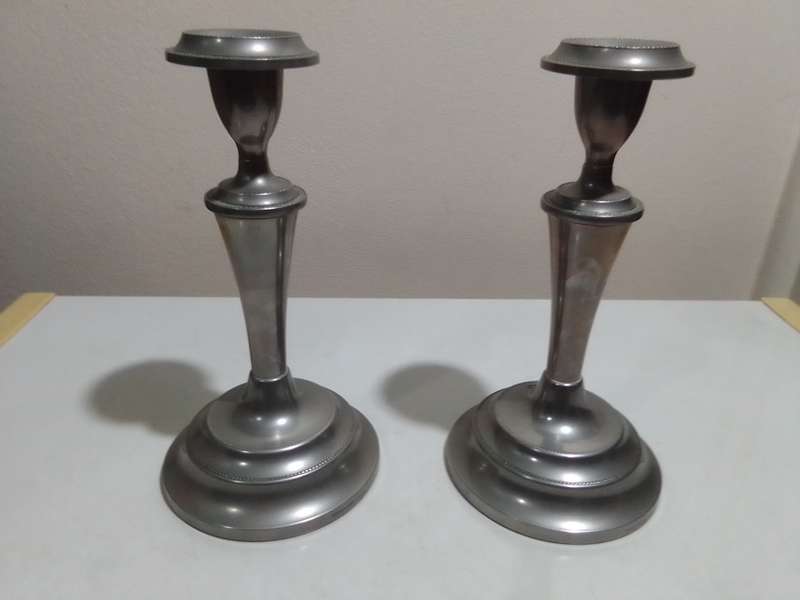 A Beautiful pair of weighted " Ianthe " candlesticks. In good condition for being antique. No dents.