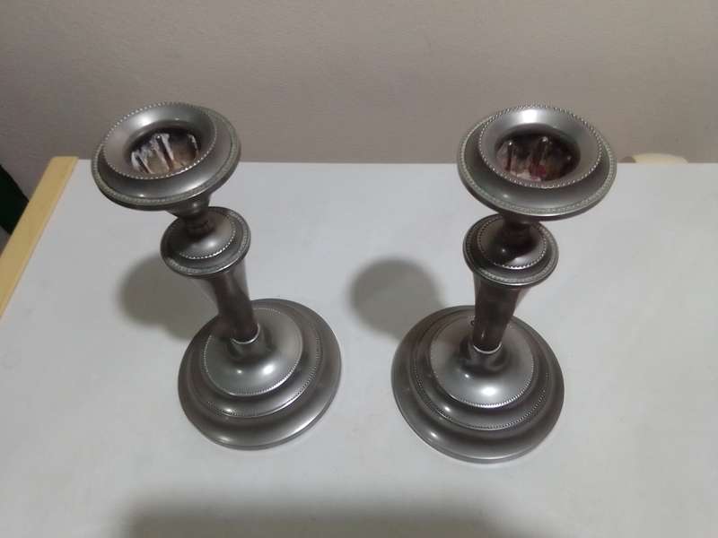 A Beautiful pair of weighted " Ianthe " candlesticks. In good condition for being antique. No dents.