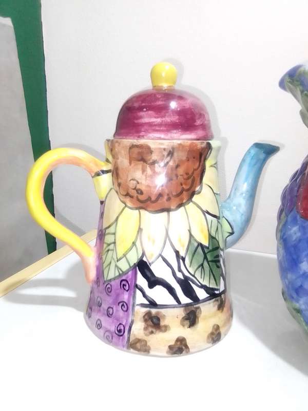 Old Pottery Kettles, very colourful and useful.