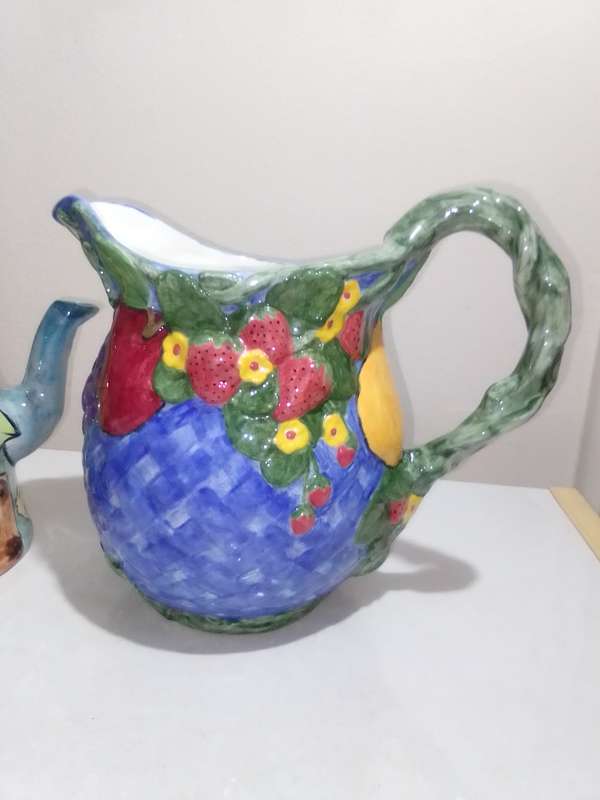 Old Pottery Kettles, very colourful and useful.