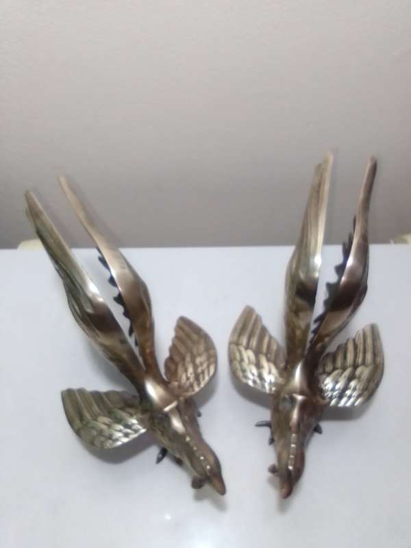 1950's Large Vintage pair of brass fighting roosters. This pair is fierce! Solid heavy cast Brass.