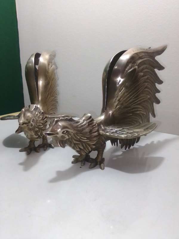 1950's Large Vintage pair of brass fighting roosters. This pair is fierce! Solid heavy cast Brass.