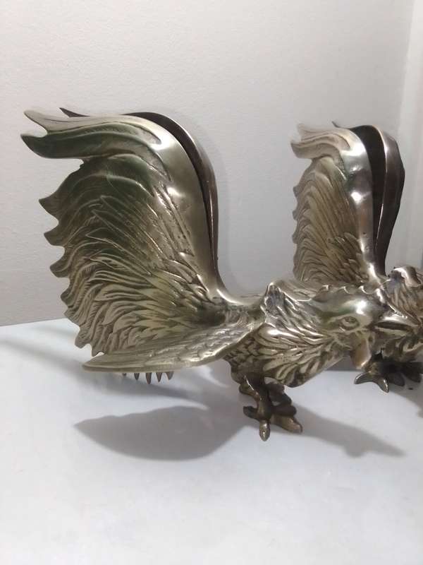 1950's Large Vintage pair of brass fighting roosters. This pair is fierce! Solid heavy cast Brass.