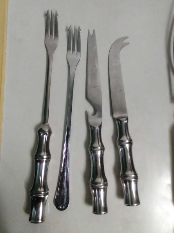 Bar set. Tool's and assorted forks. Cheese Knife and 2 Pickel forks plus bottle opener.