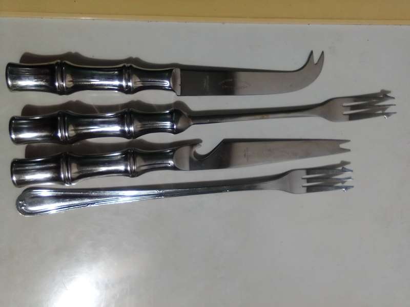 Bar set. Tool's and assorted forks. Cheese Knife and 2 Pickel forks plus bottle opener.