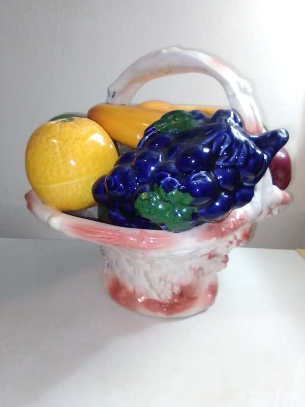 A decorative display Fruit basket ceramic glazed centerpiece. Marked B020.