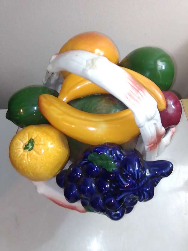 A decorative display Fruit basket ceramic glazed centerpiece. Marked B020.