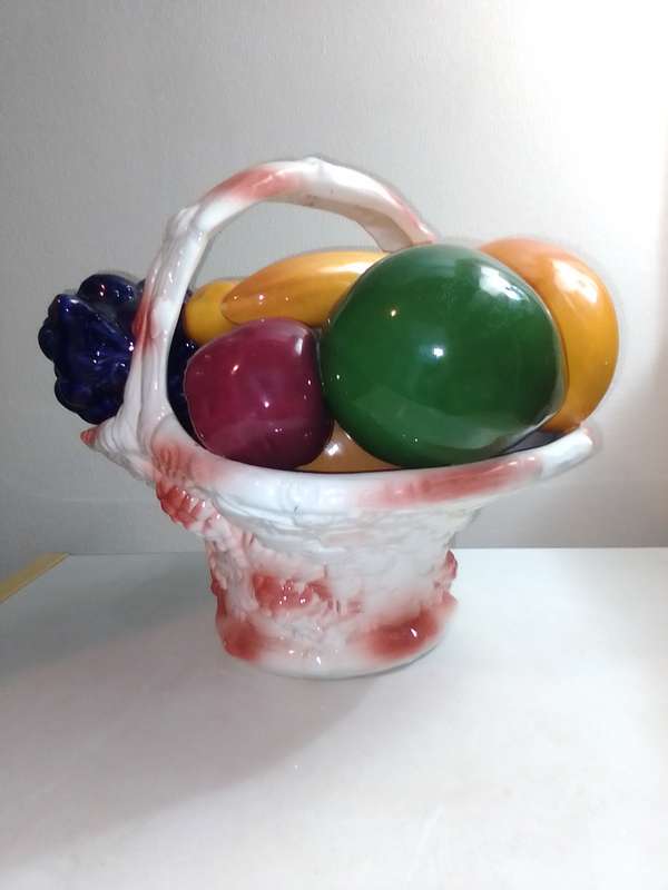 A decorative display Fruit basket ceramic glazed centerpiece. Marked B020.