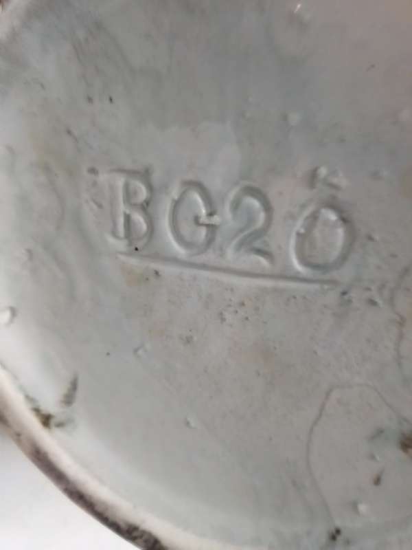 A ceramic decorative display Fruit basket marked B020 on the base.