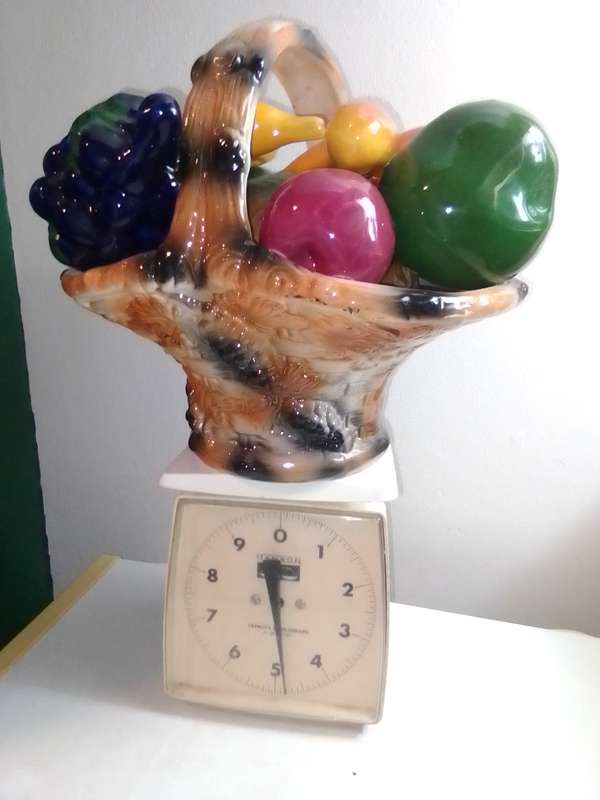 A ceramic decorative display Fruit basket marked B020 on the base.