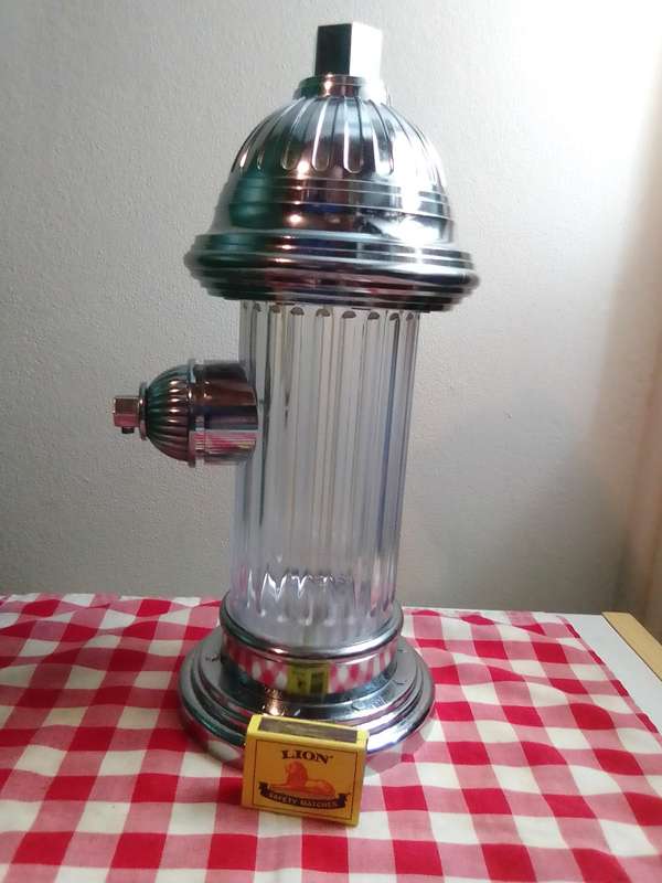 Wow 3 Items. A Soda pump Fire Hydrant, Clear Ice crusher. Old Knight bar accessories on hanger.