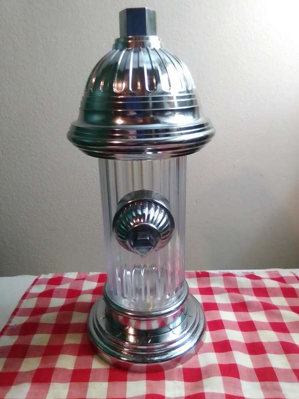 Wow 3 Items. A Soda pump Fire Hydrant, Clear Ice crusher. Old Knight bar accessories on hanger.