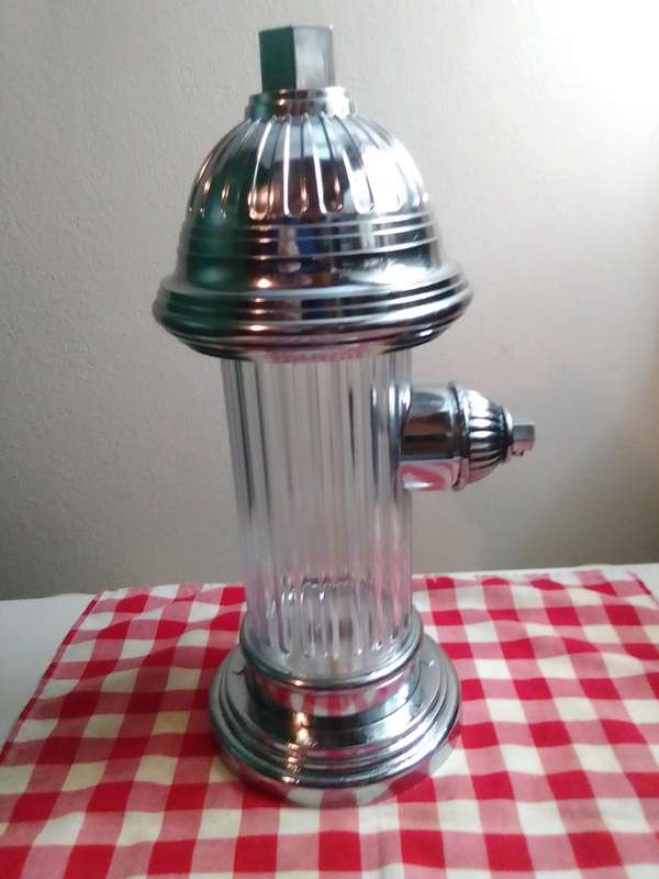 Wow 3 Items. A Soda pump Fire Hydrant, Clear Ice crusher. Old Knight bar accessories on hanger.