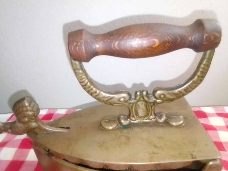 Old vintage heavy solid Brass Coal Iron with wooden handle with Rooster motif. Original condition.
