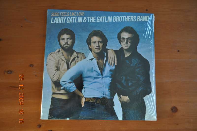 Larry Gatlin & The Gatlin Brothers Band - Sure Feels Like Love