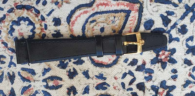 Omega buckle on strap