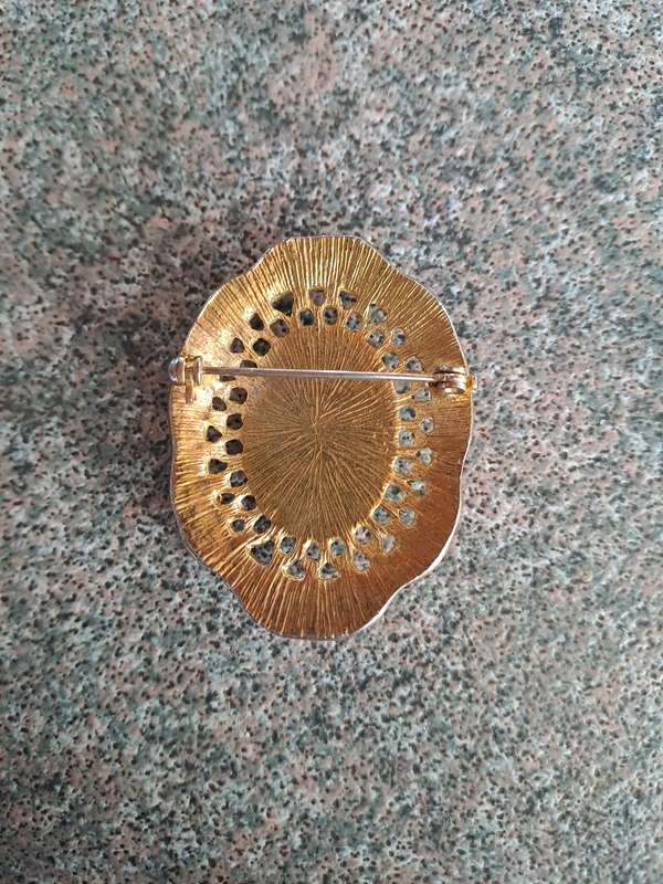 Vintage gold colored brooch with opel glass red rose design Germany