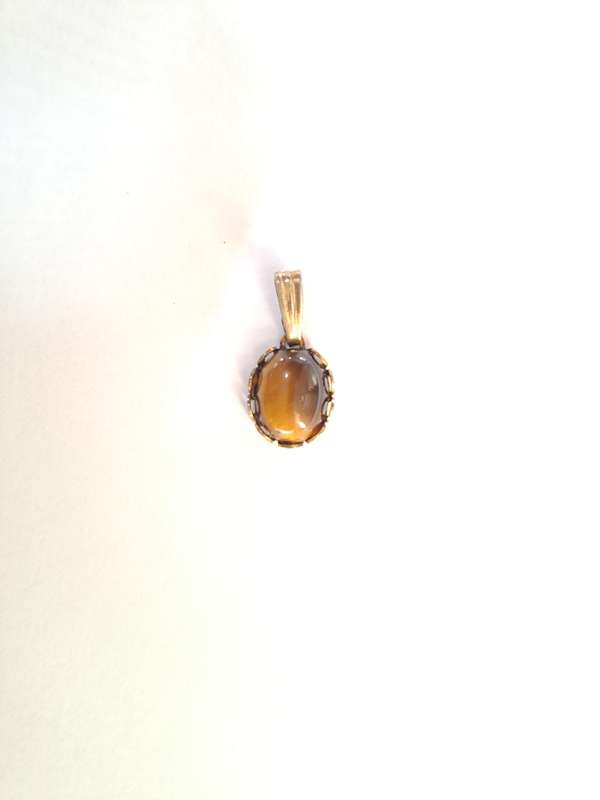 Vintage/antique Tigers eye set in gold plated setting pendant