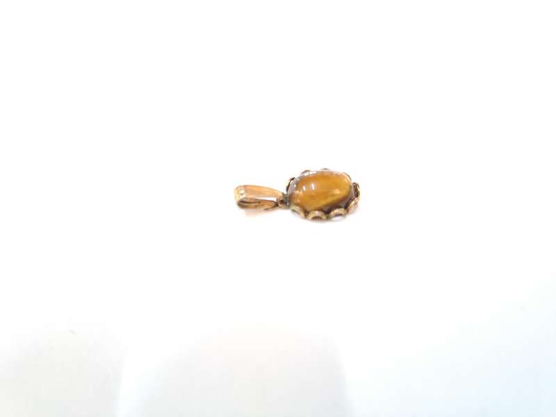 Vintage/antique Tigers eye set in gold plated setting pendant